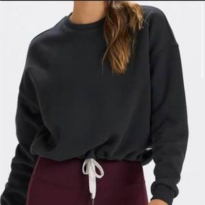 XS Vuori grey/black pull over hoodie.